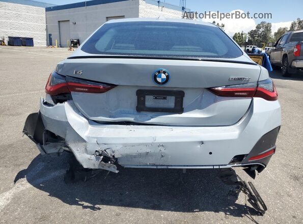 WBY43AW07RFR75786 2024 BMW I4 Blue Հետևի տեսք