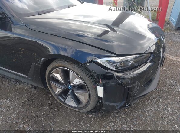 WBY43AW0XPFR21265 2023 BMW I4 Black Front view