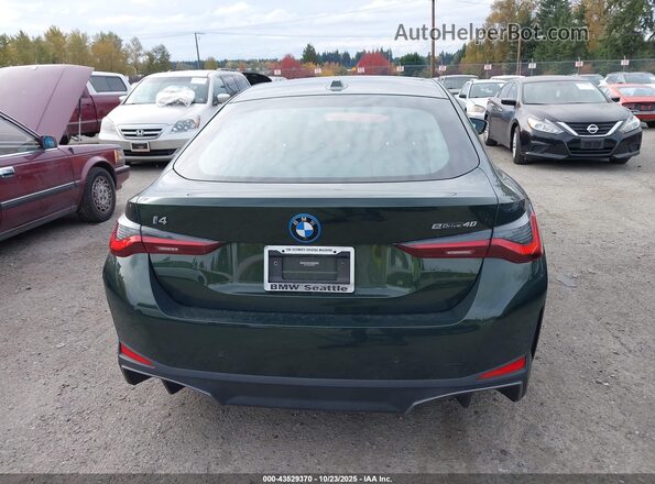 WBY73AW03PFP99233 2023 BMW I4 Зеленый 