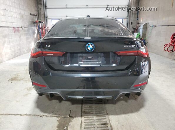 WBY73AW06PFN73798 2023 BMW I4 Black Rear view