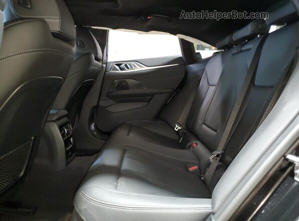WBY73AW06PFN73798 2023 BMW I4 Black Rear seats view