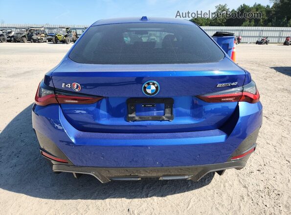 WBY73AW06RFS90322 2024 BMW I4 Blue Widok z tyłu