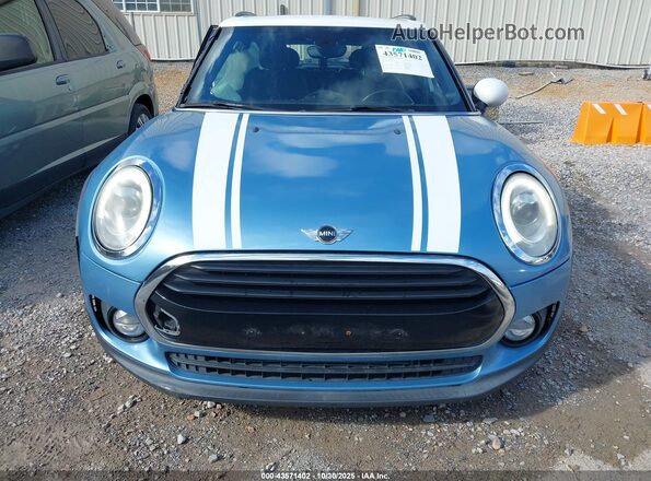 WMWLN5C52G2E31053 2016 MINI CLUBMAN Light Blue Вид задней части салона