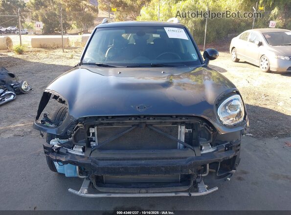 WMZYT3C34J3E93637 2018 MINI COUNTRYMAN Gray Vista interior trasera