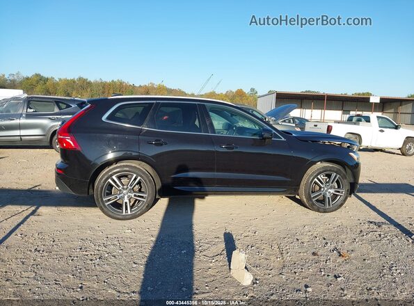 YV4102RKXM1715465 2021 VOLVO XC60 Black Widok wnętrza z tyłu