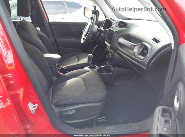 ZACNJDB16PPP33977 2023 JEEP RENEGADE Red Front interior view