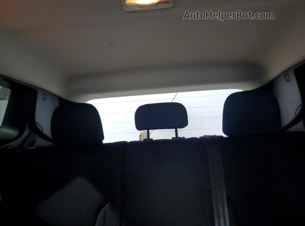ZACNJDB18PPP60761 2023 JEEP RENEGADE Red Vista de los asientos traseros