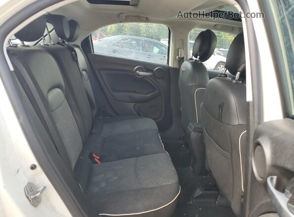 ZFBCFXAB7JP710478 2018 FIAT 500X White Vista de los asientos traseros