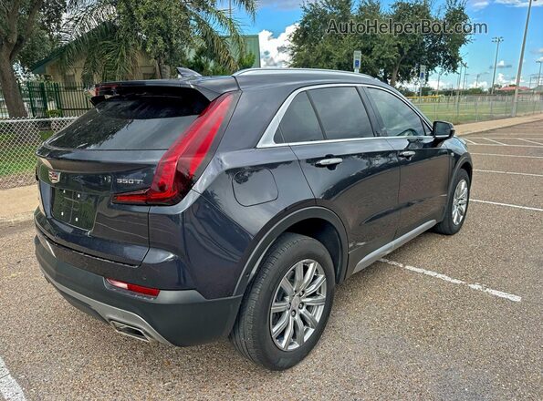 1GYFZDR43PF174188 2023 CADILLAC XT4 Blue Widok z przodu