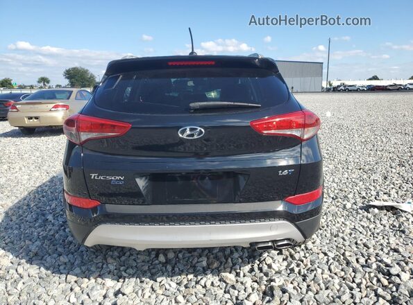 KM8J33A2XGU165002 2016 HYUNDAI TUCSON Black 