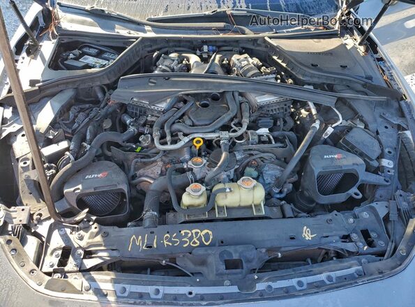 JN1EV7EL7HM553867 2017 INFINITI Q60 Gray Vista del compartimento del motor