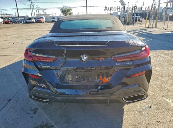WBAFY4C03MCF29680 2021 BMW M8 Blue Vista interior delantera