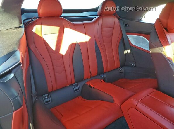 WBAFY4C03MCF29680 2021 BMW M8 Blue Vista interior trasera