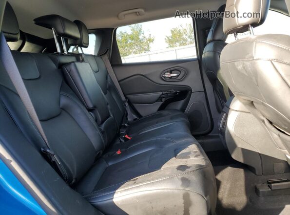 1C4PJMMB7PD109640 2023 JEEP CHEROKEE Blue Rear interior view