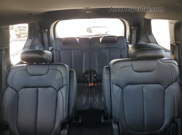 1C4RJKBG9S8632073 2025 JEEP GRAND Black Vista de los asientos traseros