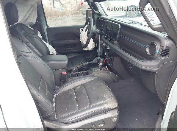 1C4RJXR68RW147455 2024 JEEP WRANGLER Teal Вид салону спереду