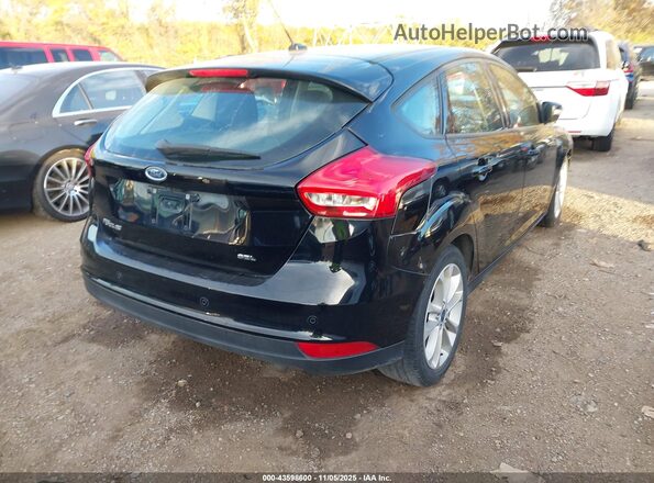 1FADP3M24JL229958 2018 FORD FOCUS Black 
