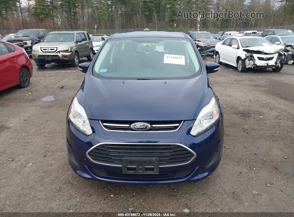 1FADP5EU7HL101557 2017 FORD C-MAX ENERGI Blue Vista interior trasera