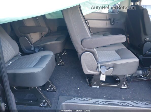 1FBAX2C82RKA15912 2024 FORD PASSENGER Black Widok naklejki z numerem VIN