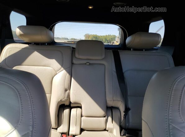 1FM5K7F80JGA04558 2018 FORD FORD EXPLORER Silver Rear seats view