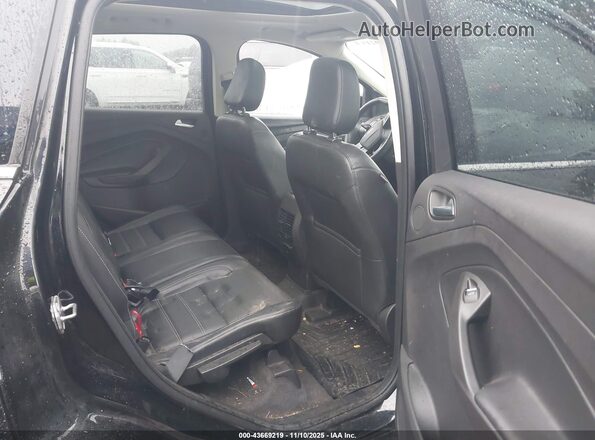 1FMCU9J94JUB92497 2018 FORD ESCAPE Black VIN sticker view