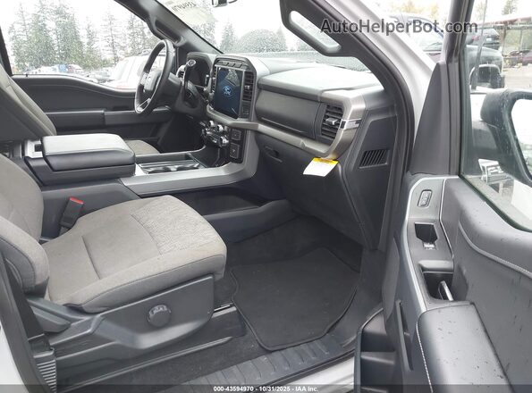1FTFW3LD9RFA25014 2024 FORD F150 Серый Вид салона спереди