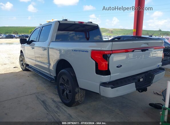 1FTVW1EV7PWG00570 2023 FORD F-150 LIGHTNING Gray Trasero izquierdo