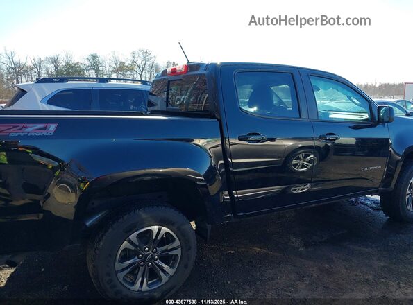 1GCGTDEN5M1250660 2021 CHEVROLET COLORADO Black Rear interior view