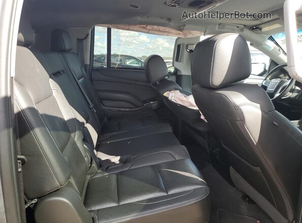 1GKS2GKC0LR120100 2020 GMC YUKON Gray Vista de los asientos traseros