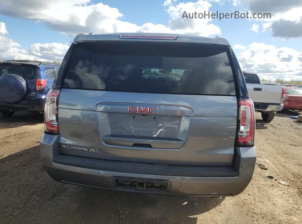 1GKS2GKC0LR120100 2020 GMC YUKON Gray Vista trasera