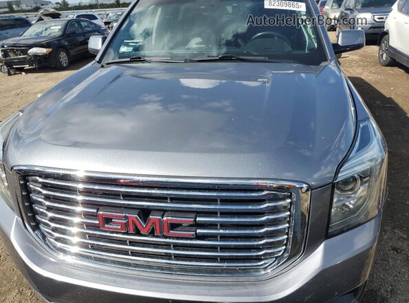 1GKS2GKC0LR120100 2020 GMC YUKON Gray Vista interior trasera