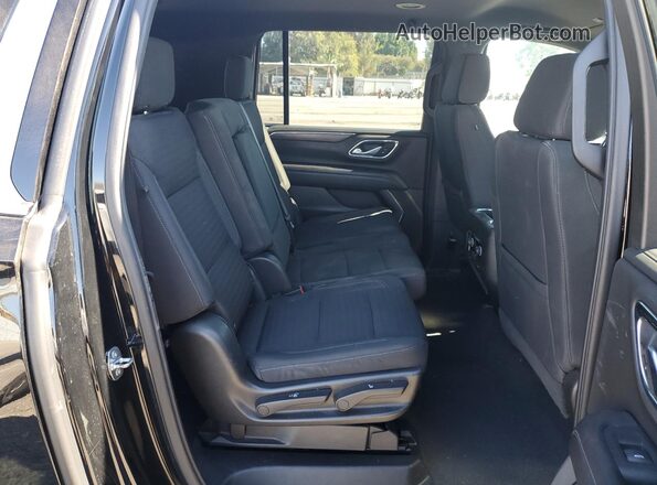 1GNSCBKDXPR148942 2023 CHEVROLET SUBURBAN Black Rear interior view