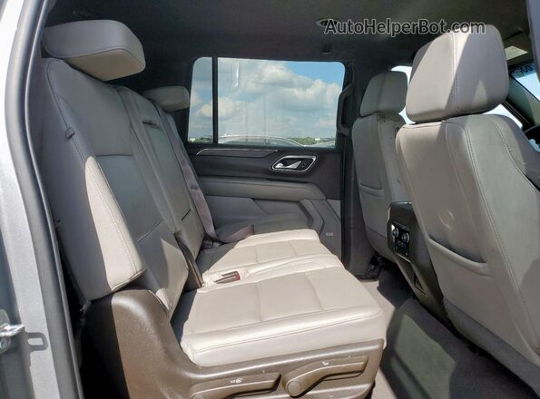 1GNSCCKD9PR320805 2023 CHEVROLET SUBURBAN Gray Vista interior trasera