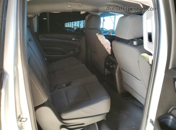 1GNSCGKC3KR264769 2019 CHEVROLET SUBURBAN Silver Widok wnętrza z tyłu