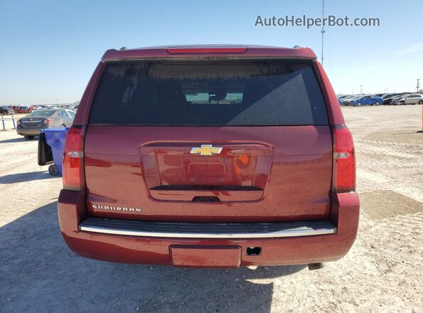1GNSCJKCXGR459823 2016 CHEVROLET SUBURBAN Maroon Вид ззаду