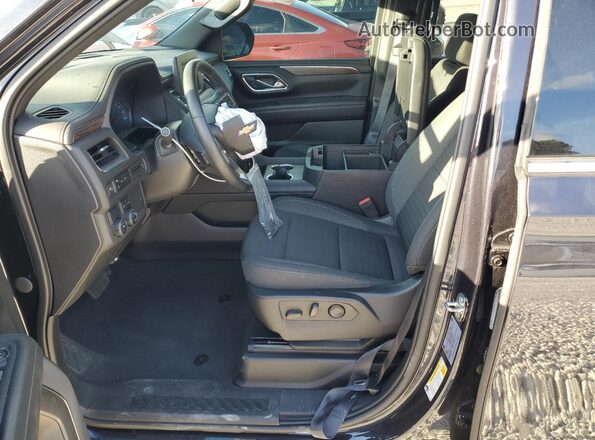 1GNSCMKD4PR234095 2023 CHEVROLET TAHOE Черный Вид салона спереди