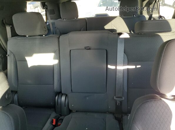 1GNSCMKD4PR234095 2023 CHEVROLET TAHOE Черный Вид задних сидений