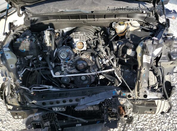 1GNSCMKD4PR234095 2023 CHEVROLET TAHOE Черный Вид подкапотного пространства