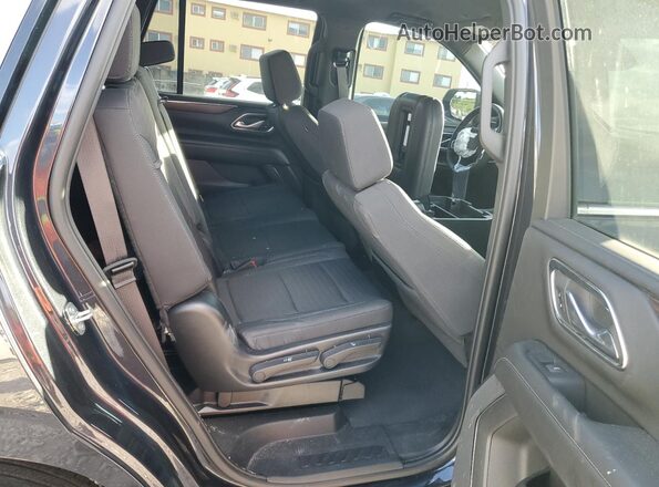 1GNSCMKD4PR234095 2023 CHEVROLET TAHOE Черный Вид задней части салона