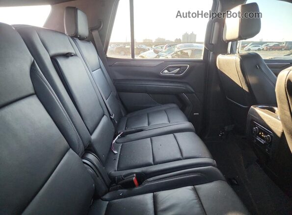 1GNSCNKD0PR259209 2023 CHEVROLET TAHOE White Rear interior view