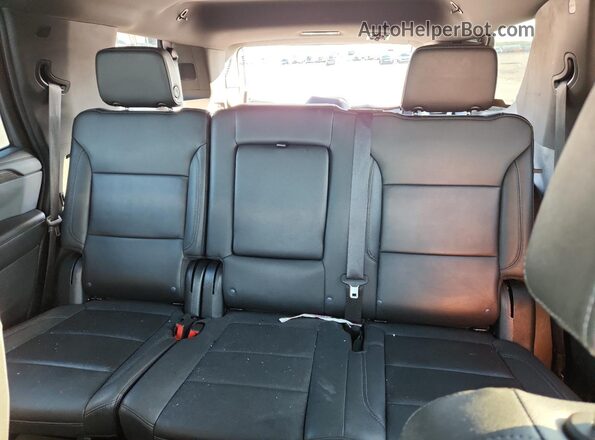 1GNSCNKD0PR259209 2023 CHEVROLET TAHOE White Rear seats view
