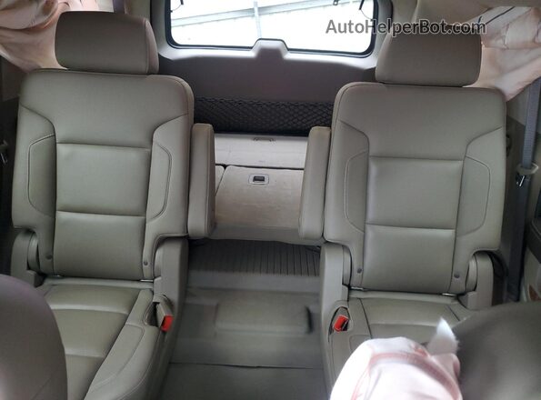 1GNSKCKC9LR228792 2020 CHEVROLET TAHOE Бордовый Вид задних сидений