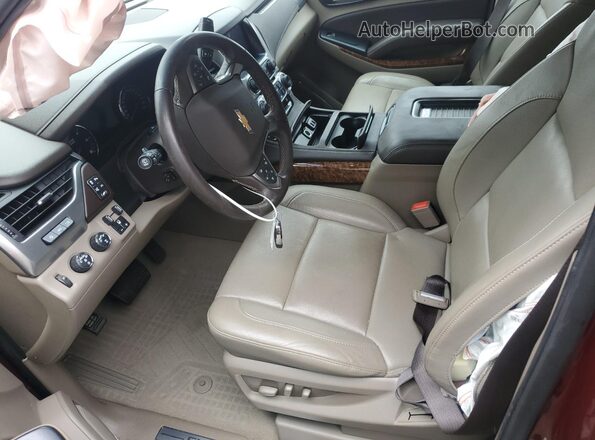 1GNSKCKC9LR228792 2020 CHEVROLET TAHOE Бордовый Вид салона спереди