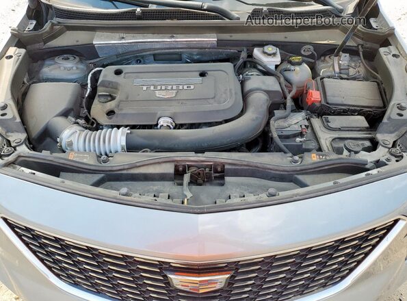 1GYAZAR44PF172975 2023 CADILLAC XT4 Silver 