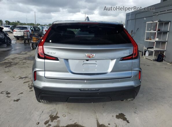 1GYAZAR45RF183597 2024 CADILLAC XT4 Gray Вид ззаду