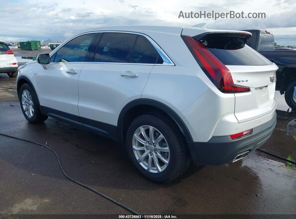 1GYAZAR49NF107519 2022 CADILLAC XT4 White 