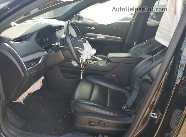 1GYFZDR40PF152875 2023 CADILLAC XT4 Black წინა სალონის ხედი