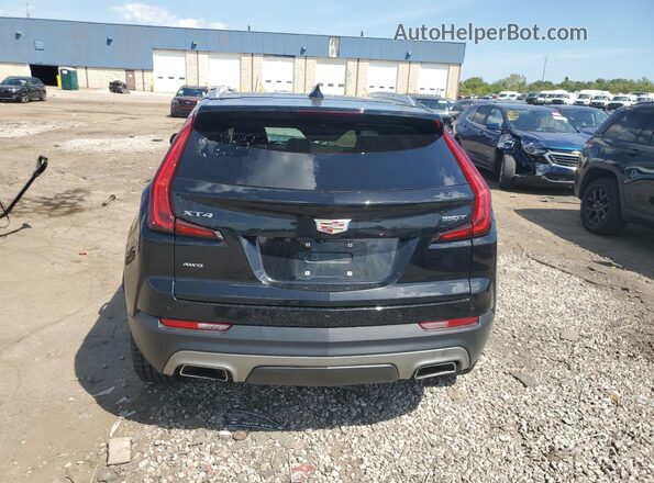 1GYFZDR40PF152875 2023 CADILLAC XT4 Black უკანა ხედი