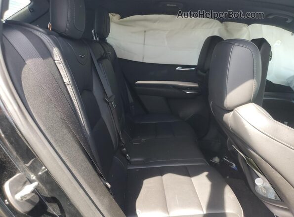 1GYFZDR40PF152875 2023 CADILLAC XT4 Black უკანა სალონის ხედი