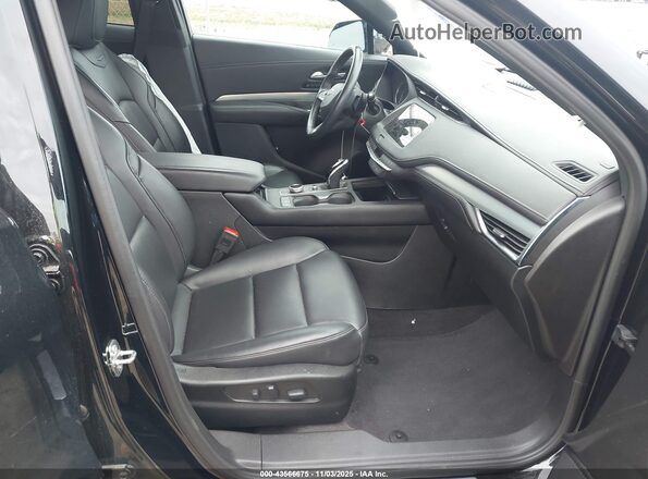 1GYFZDR42PF140792 2023 CADILLAC XT4 Black წინა სალონის ხედი
